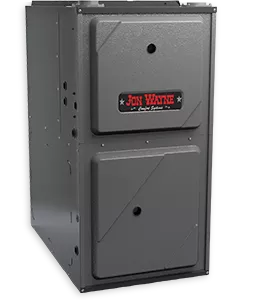 Dark gray furnace with a Jon Wayne branded sticker centered on the front of it.