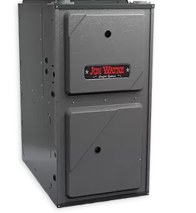 Dark gray furnace with a Jon Wayne branded sticker centered on the front of it.